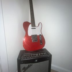 Electric Fender Guitar And Amp