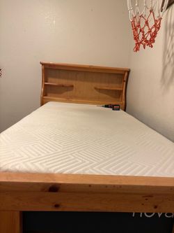 Free! Wooden twin bed frame with drawers