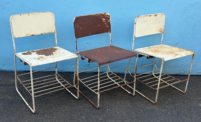 Pair of vintage industrial steel school chairs