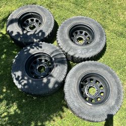 15” Black rims with tires.  Rims 15x10 w/ 5x5.5 lug pattern.  31x10.5r15 