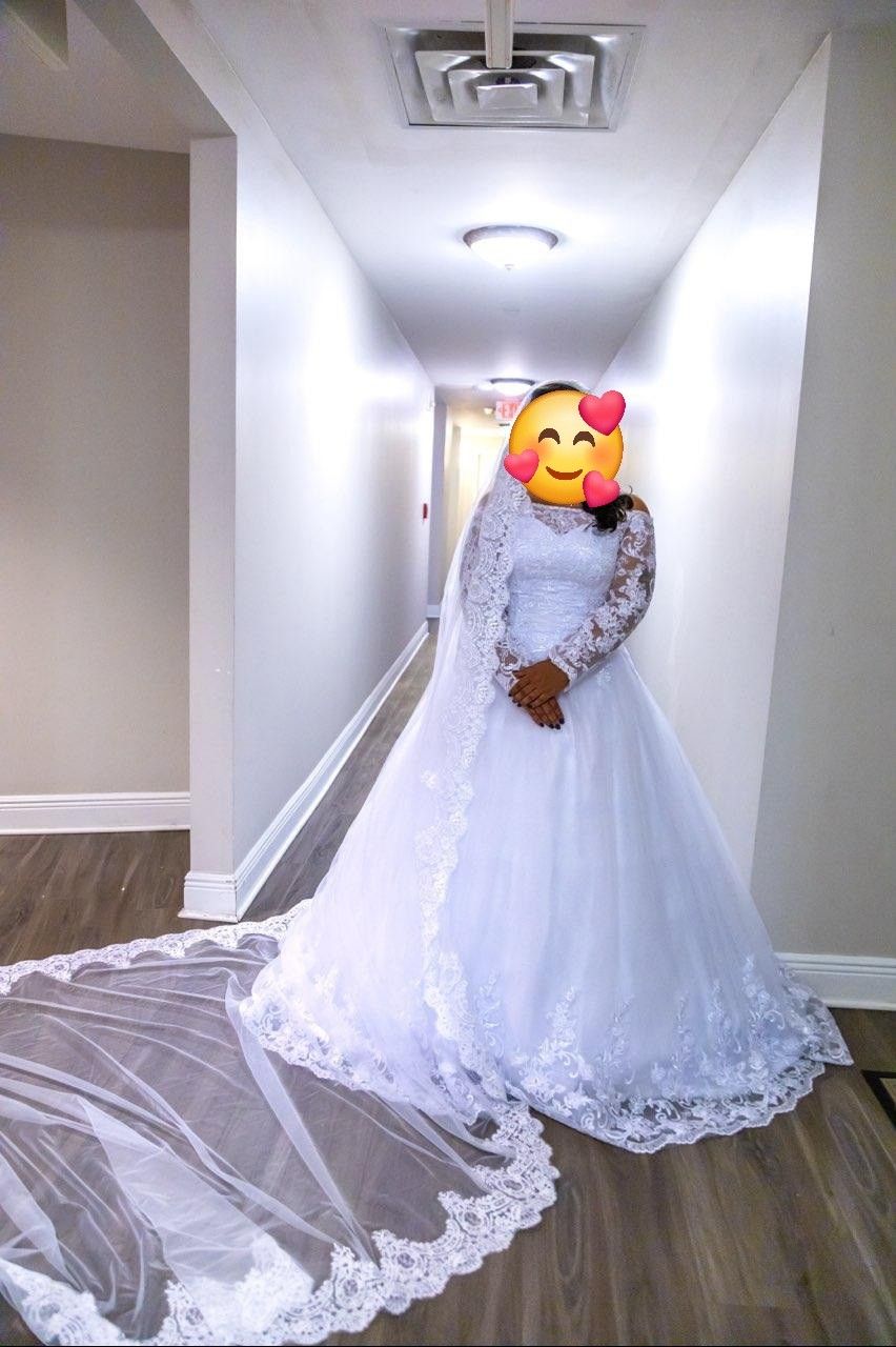 White Wedding Dress And Cathedral Veil