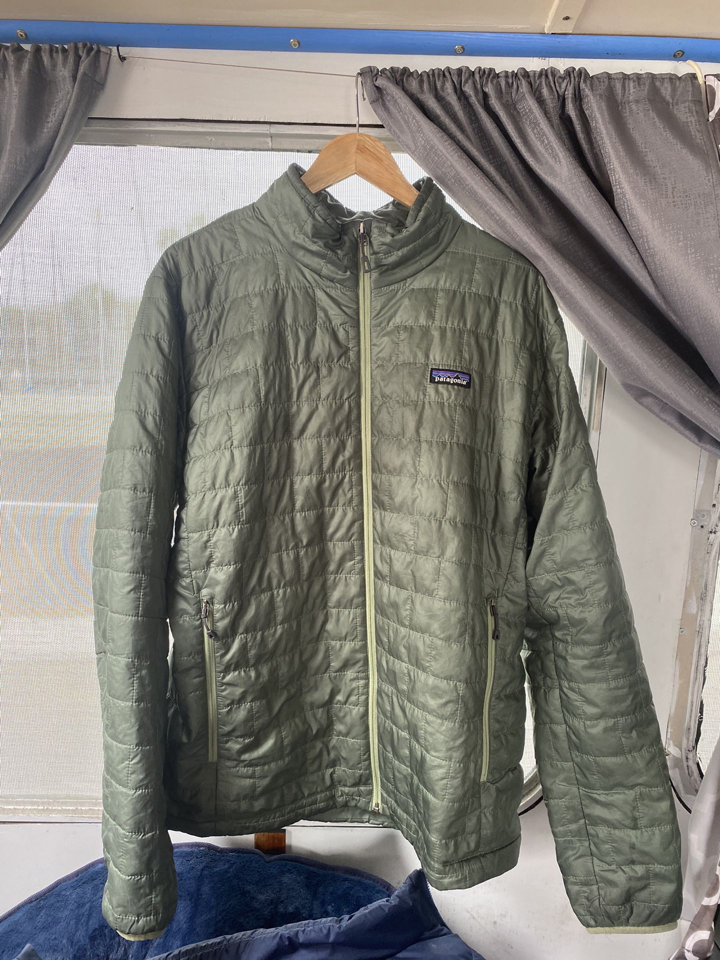 Patagonia men’s XL green  nano puffer jacket.  Some minor stains on arms 