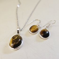 18" Tiger's Eye Sterling Silver Plated Pendant & Matching Earrings Set. Chain is standard costume jewelry. New! Makes a great holiday Christmas gift o