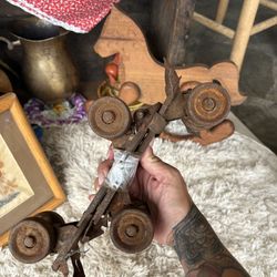  vintage, rusty pair of metal clamp-on roller skates,  dating from the 1940s or 1950s
