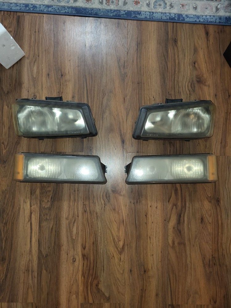 Replacement 4 Pc. Headlights & Park Signal Lamps Compatible with 2004-2006 Silverado Fleetside Chevy Pickup.