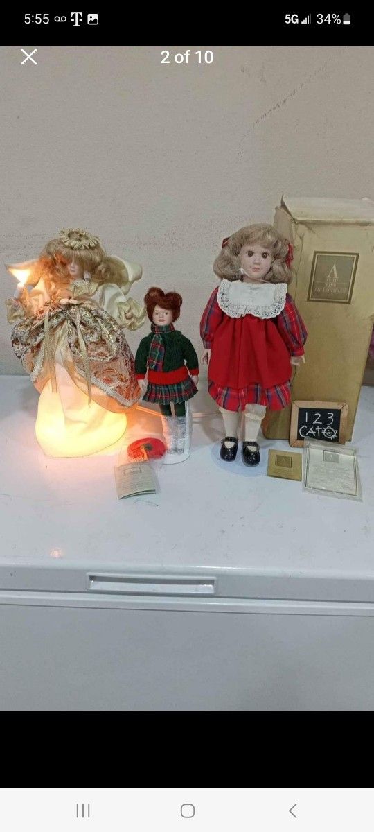 3 Avon Porcelain Dolls