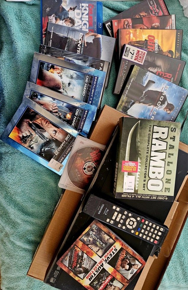 BLUERAY  PLAYER  & 2 BOXES  OF  DVD VIDEO'S 
