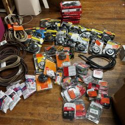 50+ Pieces/Brush cutters,trimmer heads,tractor deck belt, saw chains and particulate filter...  7 Honeywell filters 10 brush cutters ( bladed trimmer 
