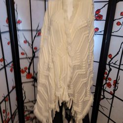 PRE LOVED "JUST JAMIE SOFT CREAMY KNIT CAPE WITH FRINGE/PUFFY KNIT