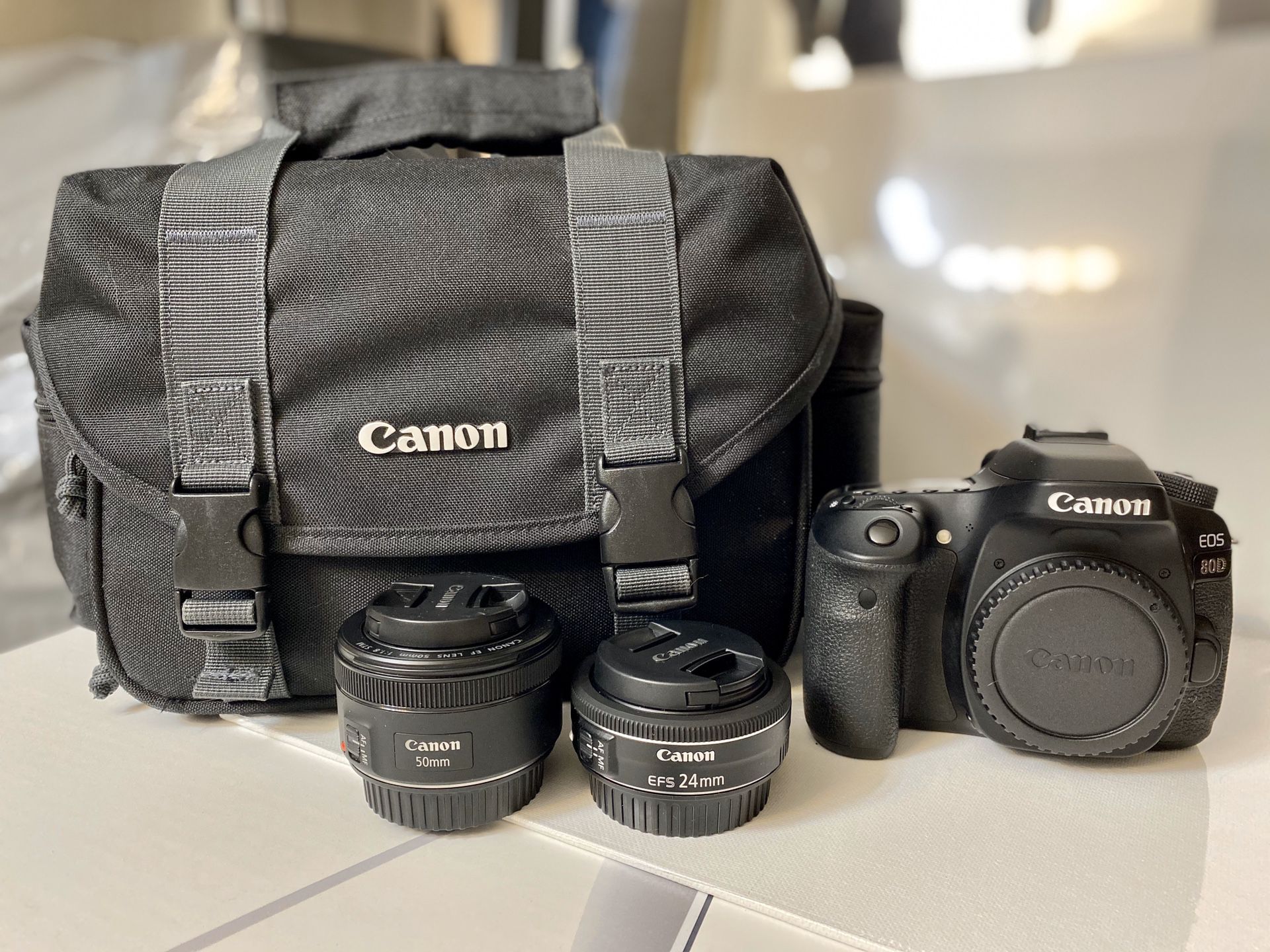 Canon EOS 80d DSLR camera + 50mm f1.8 + 24mm f2.8