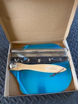 Pizza peel and rocker cutter