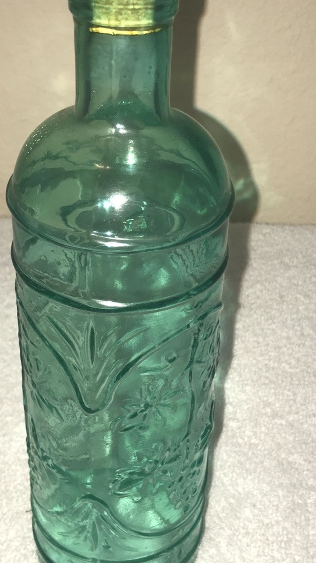 Vintage COLLECTIBLE Pale Green Glass Bottle w/ Decorative Embossed Grape Pattern