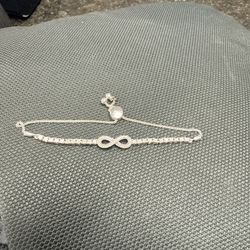 10k White Gold Infinity With Diamonds All The Way Across