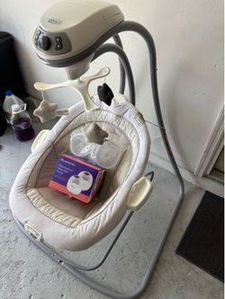 Baby swing set/bounce and brand new hand free breast pump for sale