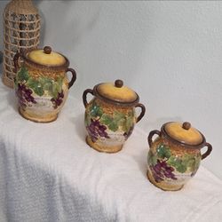 Certified International Gilded Wine Ceramic 3-Piece Canister Set.