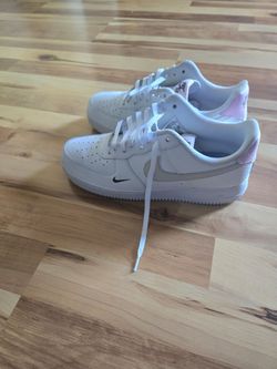 Air Force Ones pink and black Nike symbol