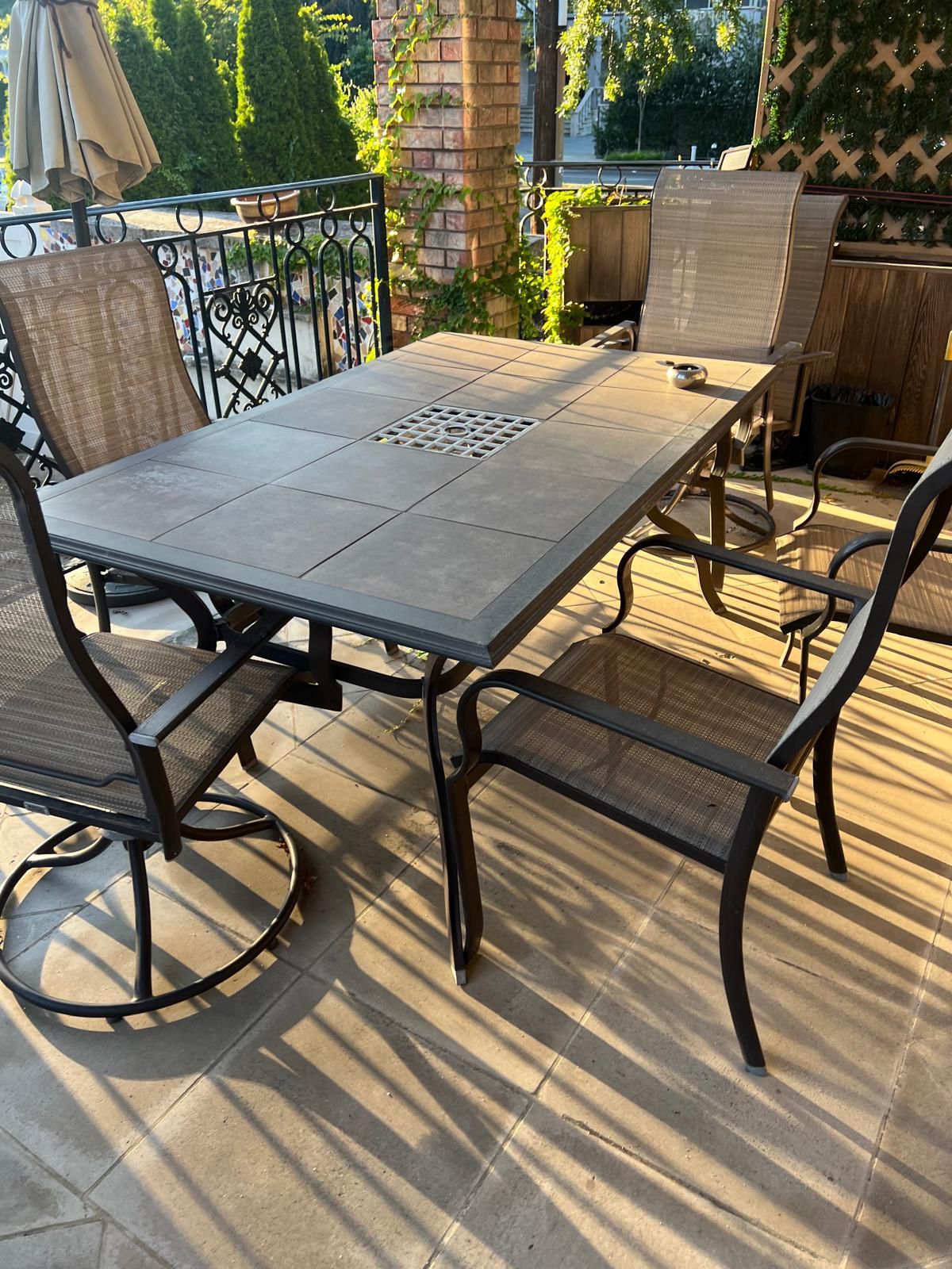 Outdoor patio set - table 6 chairs, 2 swivel chairs and umbrella