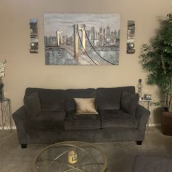 Gray Sofa and Ottoman 