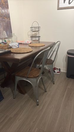Dining table and two chairs