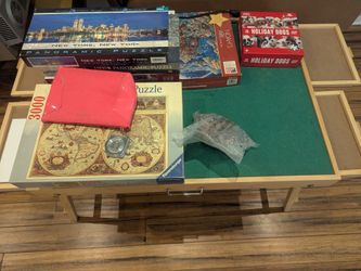 Set of 7 Ravensburger Puzzles with Puzzle Table Included