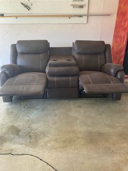 Sofa for three (2 recliners and middle console )