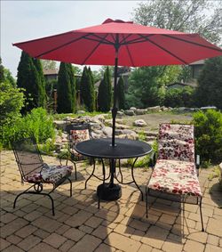 Patio set with umbrella and cushions