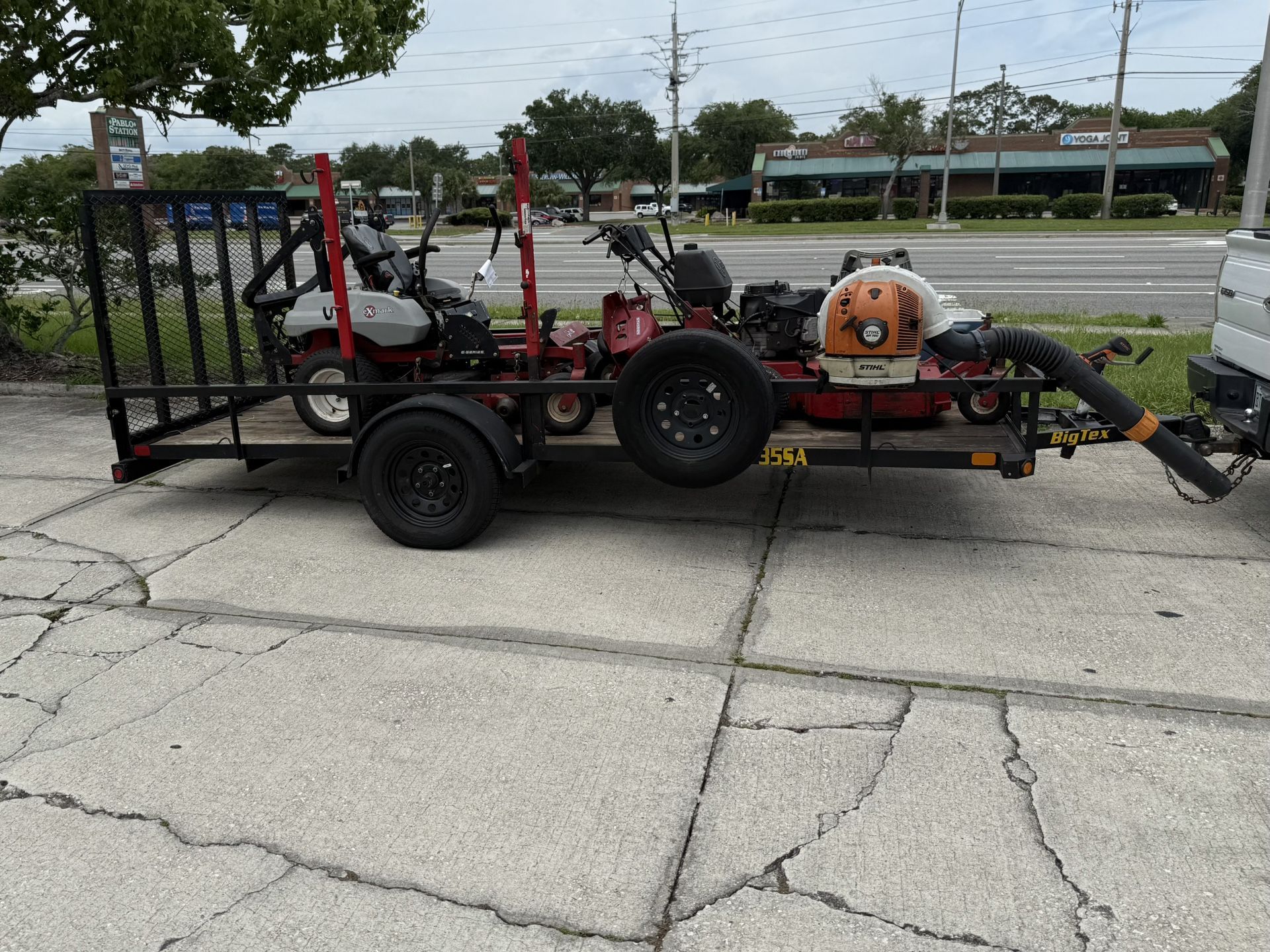 Trailer and two zero turn mowers Blower Weed Whacker And Trimmer