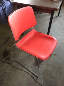 Set of two orange and chrome chairs
