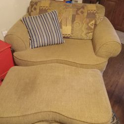Oversized Chair With Rolling Footstool