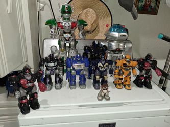 Vintage collectible Robots.  Good Condition. 
- Big Vintage Mastermind Mr. Robot
- Robot leader by SON-Ai
- 2   Red and black Hap-pi-kid Robot/ 1 blac