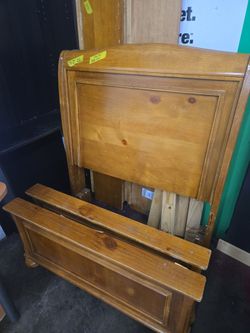 2 matching maple twin bed frames