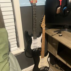 electric guitars with amps