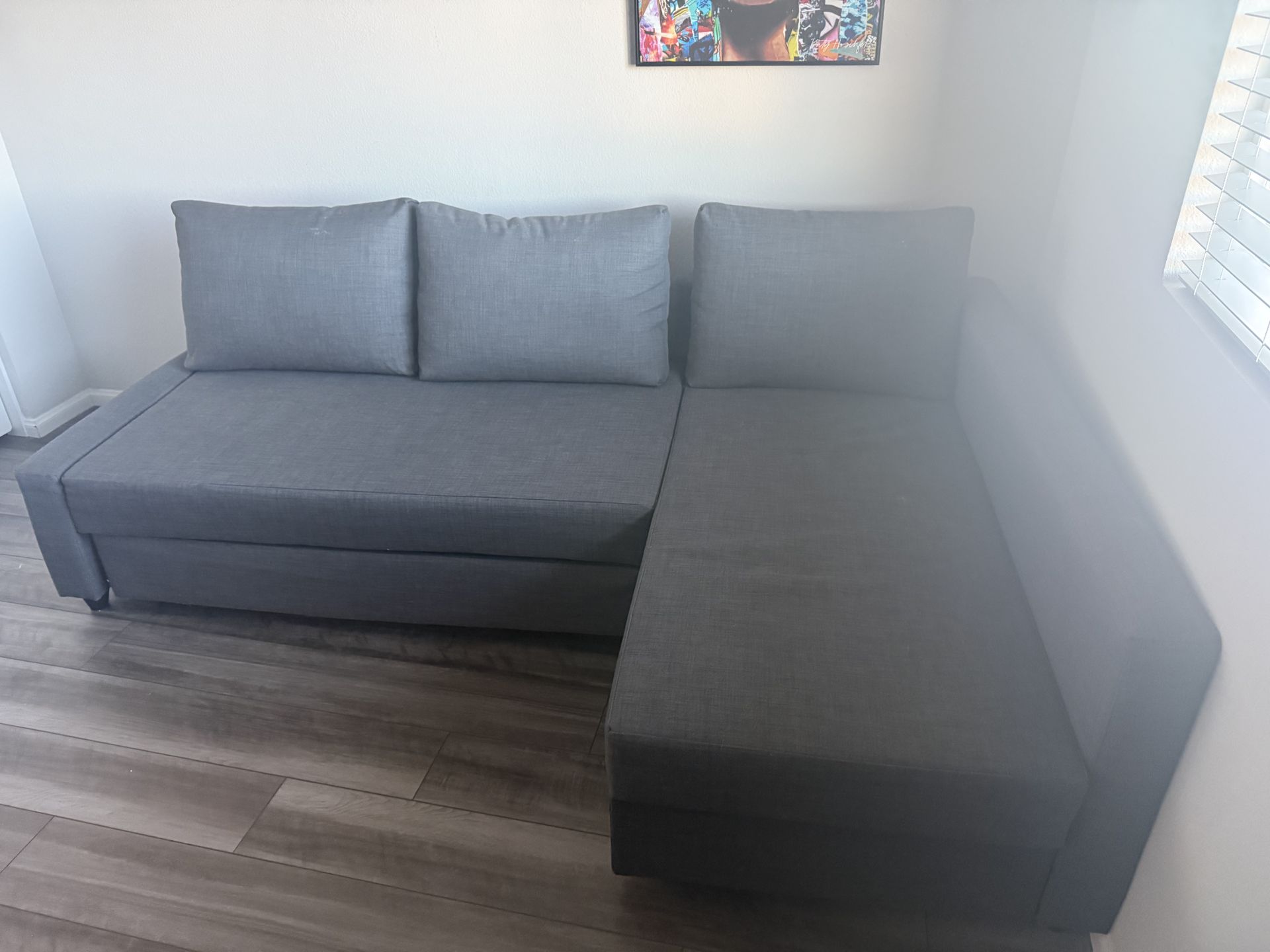 Grey IKEA sectional pull out bed