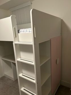 IKEA bunk bed with under desk office area and armory