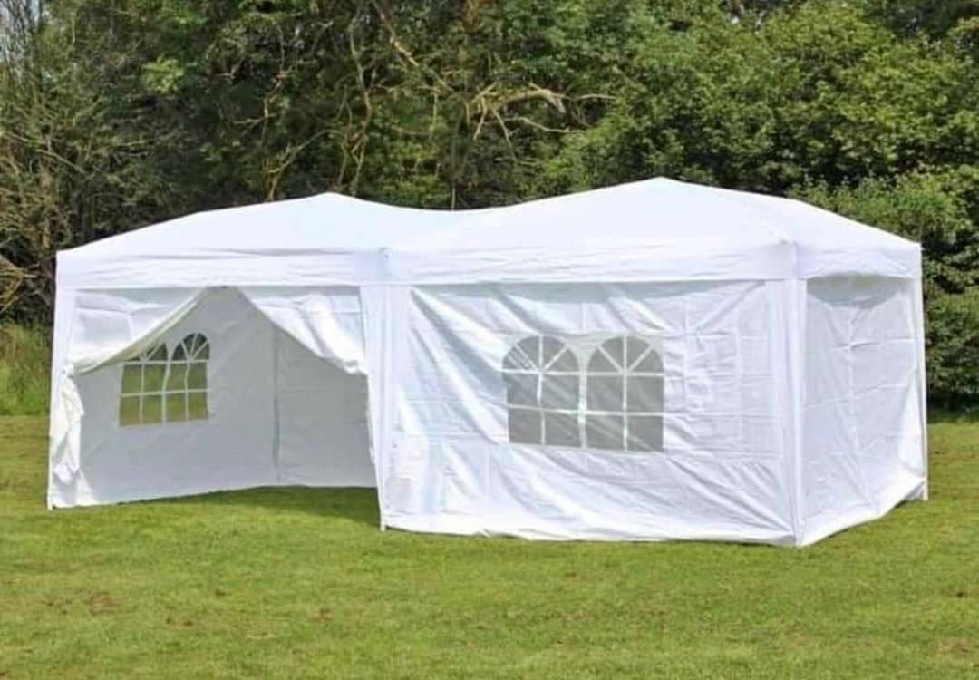 10x20 Canopy canopy tent w/6 walls Side.
New!!!