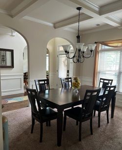 Dark brown  dining Big. Size table and chairs  7 pieces