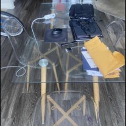 Glass Table with Plastic clear chairs