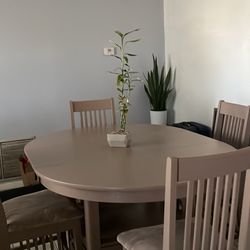 4 Chairs And A Table