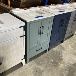24” Bathroom Vanity in blue , single sink soft close solid wood with vanity top in white  $349  Luke’s liquidations warehouse Address:  2434 N Forsyth