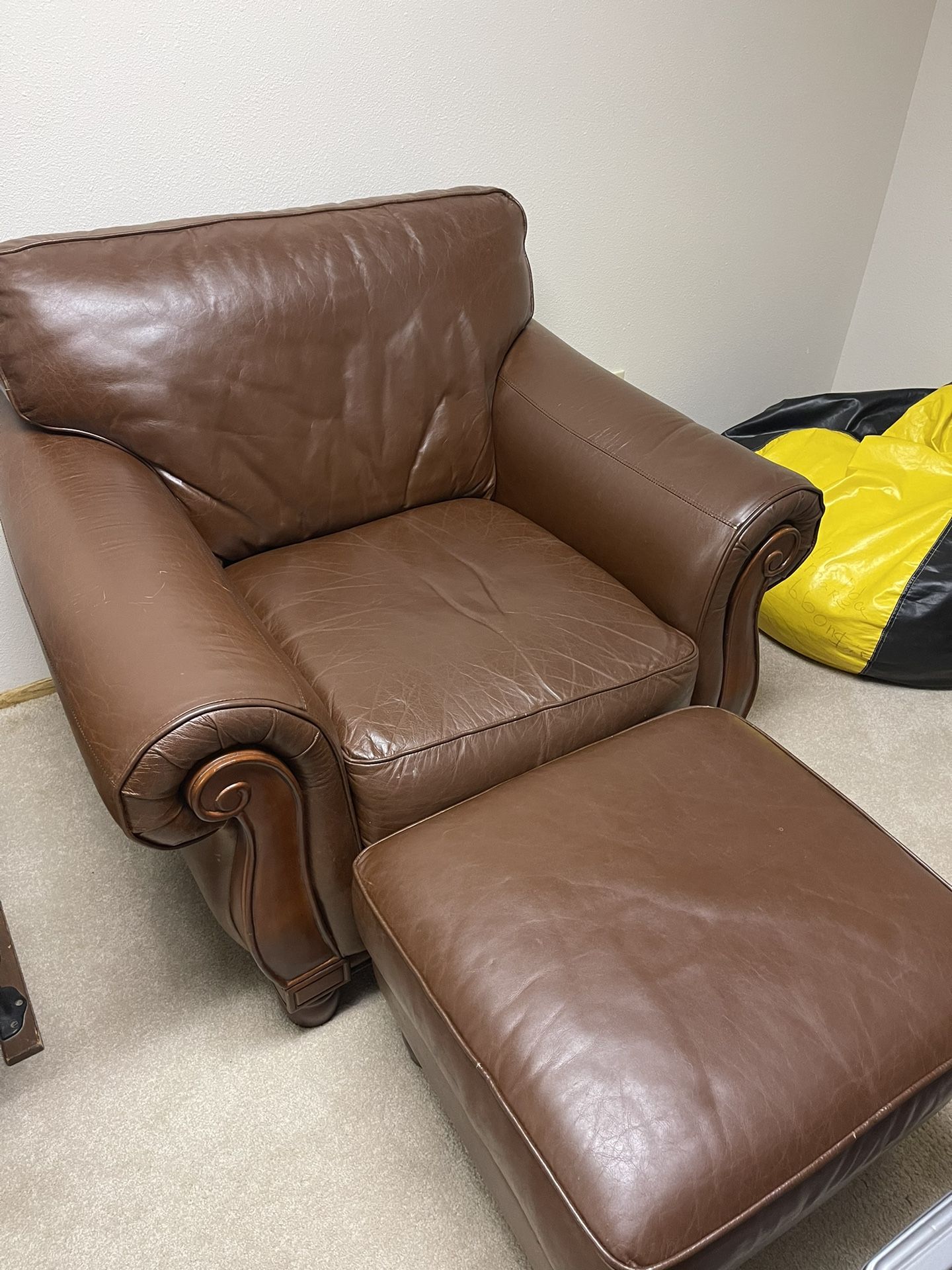 Brown Leather Chair and Ottoman