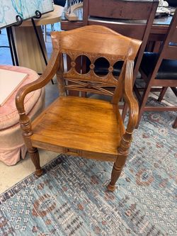 Carved Wood Armchair with Decorative Back