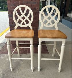 Set of two wooden dining chairs