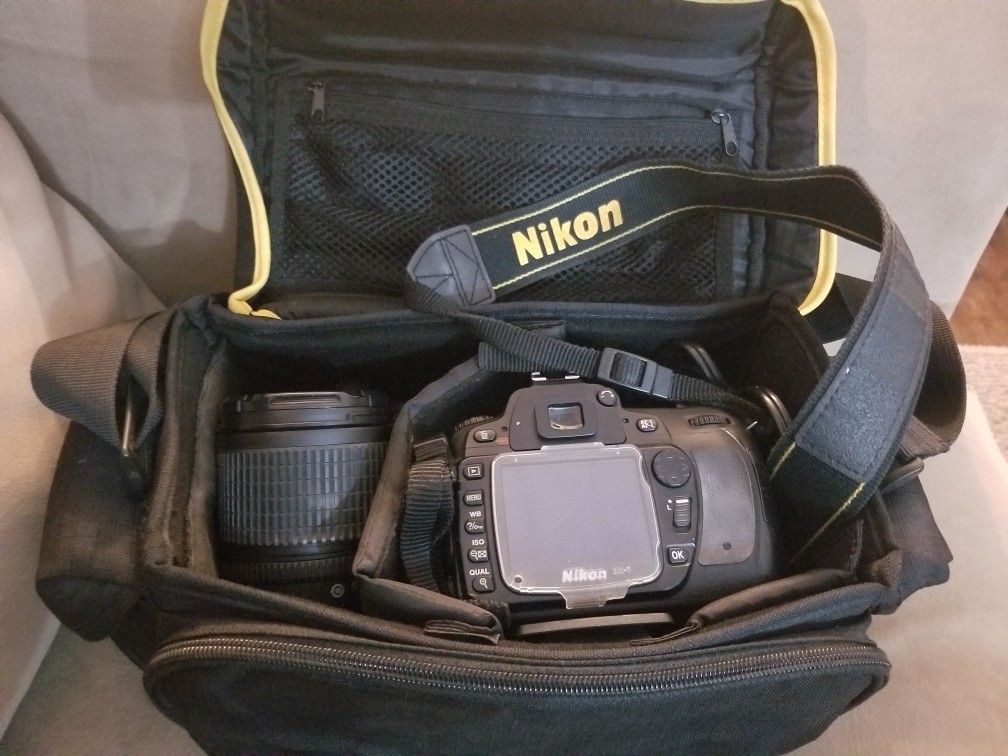 Nikon D80 camera, lenses, charger, 2 batteries, and carrying case