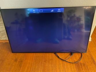 Vizio TV with mounting hardware