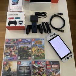 Nintendo Switch OLED 64GB Handheld Game Console With White Joy-Cons