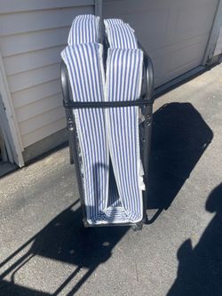 Folding Twin Bed with Blue Striped Mattress