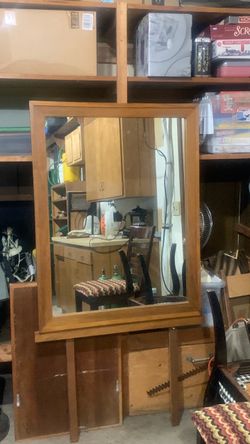 Large wood framed mirror