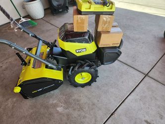 RYOBI 40V HP Brushless 18 in. Battery Powered Rear Tine Tiller with (4) 6.0 Ah Batteries and Charger