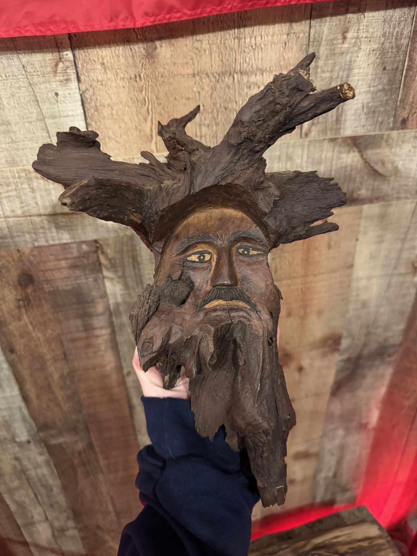 Antique wooden face carving