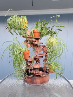 15-tiered copper water fountain with plant pots